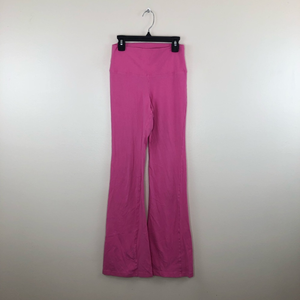 Aritzia TNA pink flare leggings size medium